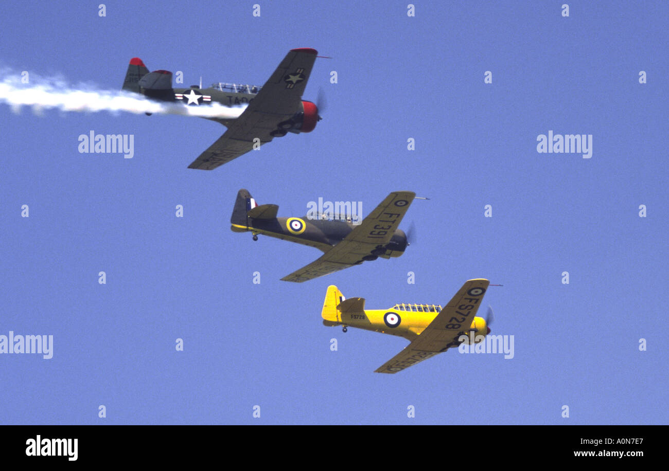 North American AT6 Harvard Texan Trio Flypast Coventry Airport Airshow Stock Photo