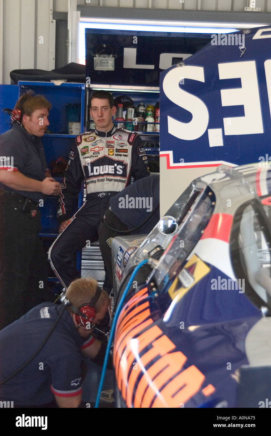 NASCAR driver Kyle Busch speaks with mechanic in garage Stock Photo Alamy