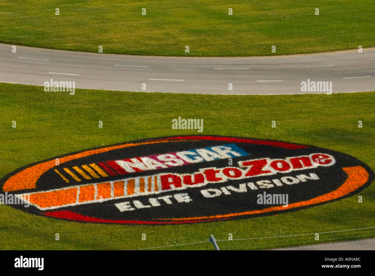 NASCAR ground painting log on the grass of the infield at Kentucky