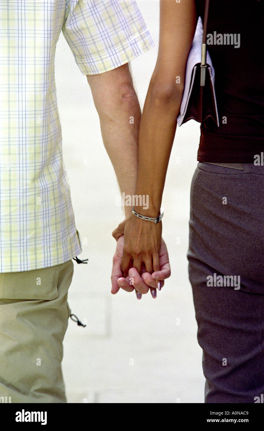 Couple holiday holding hands hi-res stock photography and images - Alamy
