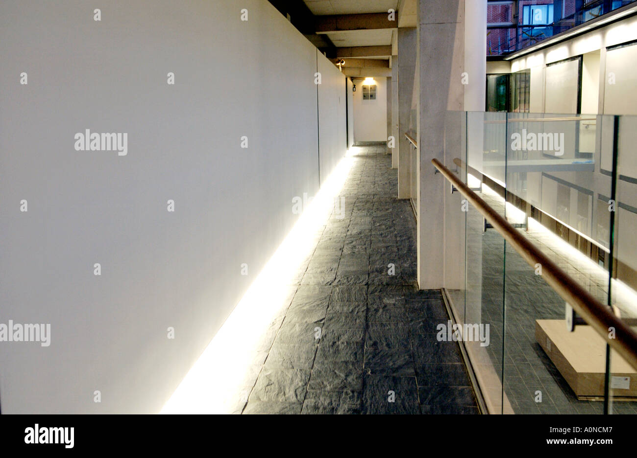 Corridor with slate floor in public area of the new building for the National Assembly for Wales in Cardiff Bay South Wales UK Stock Photo