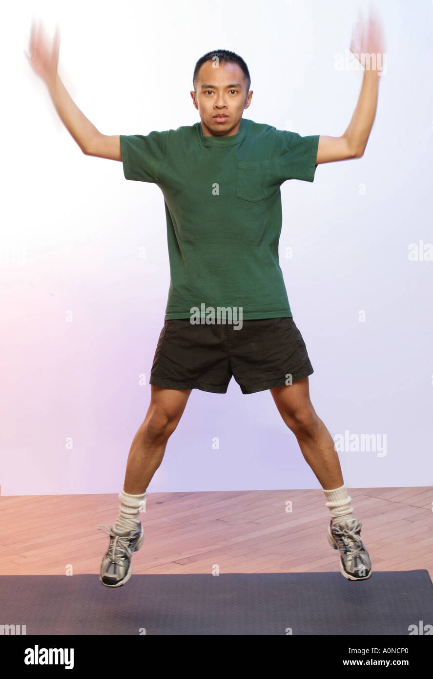 Man doing jumping jacks home workout exercise Vector Image