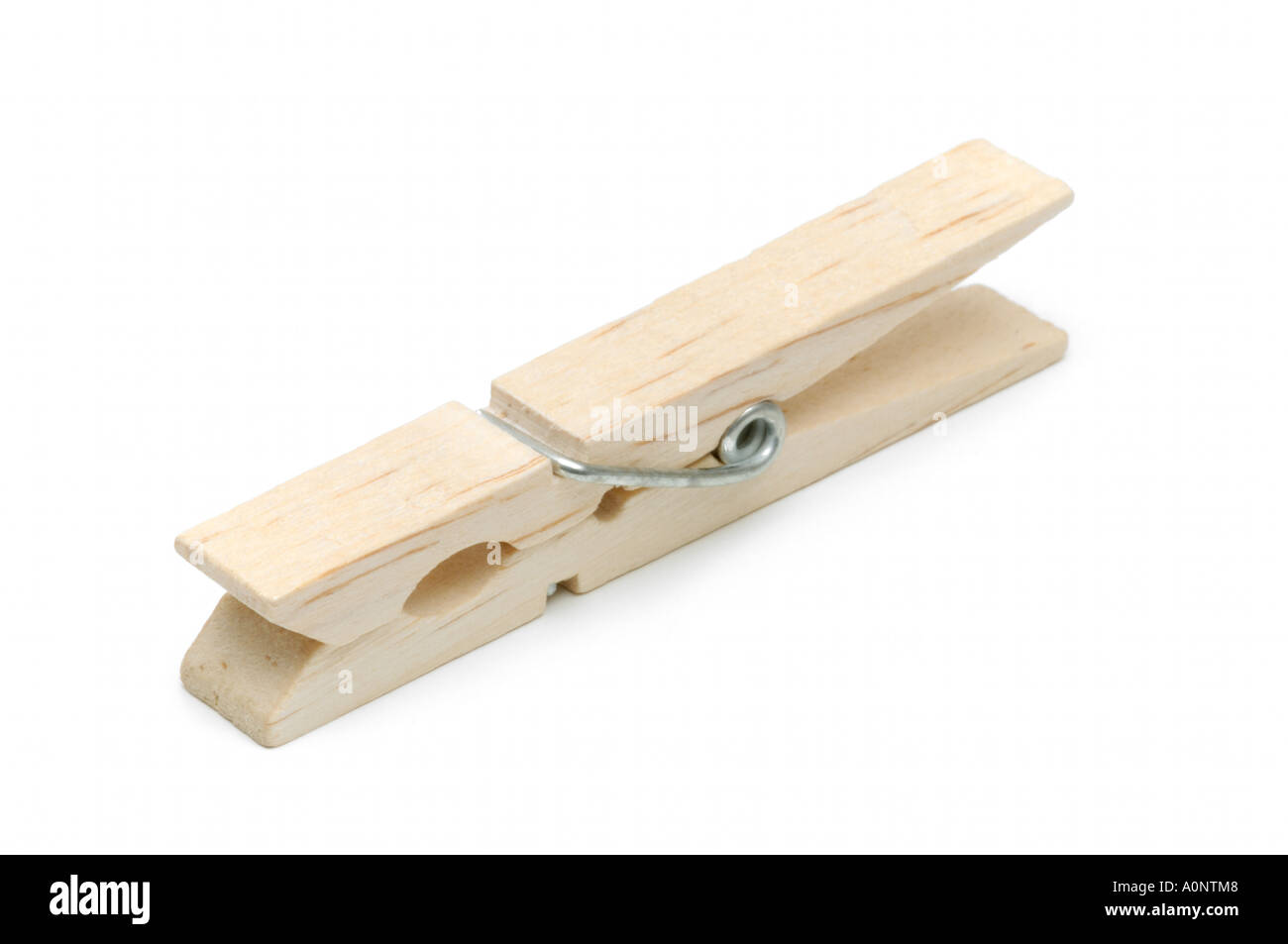 Wooden peg used on washing lines on white background Stock Photo Alamy