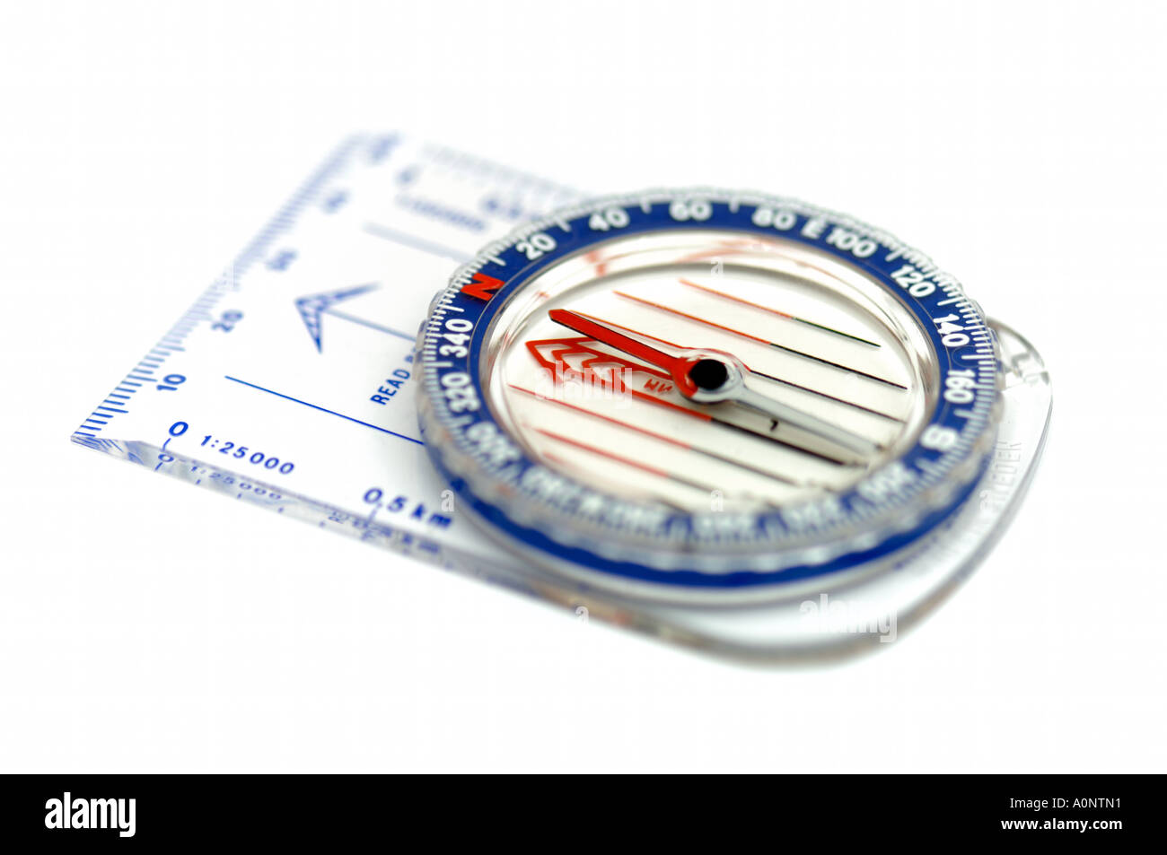 Plastic Map navigation compass on white background Stock Photo Alamy