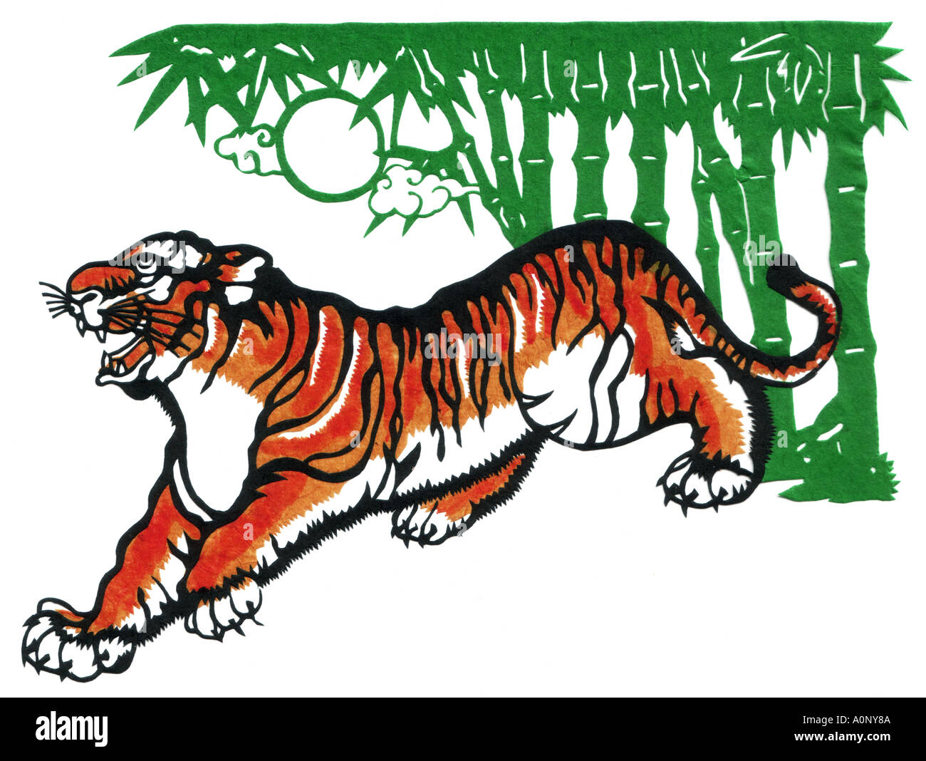 tiger big cat feline bamboo forest rock Stock Photo - Alamy