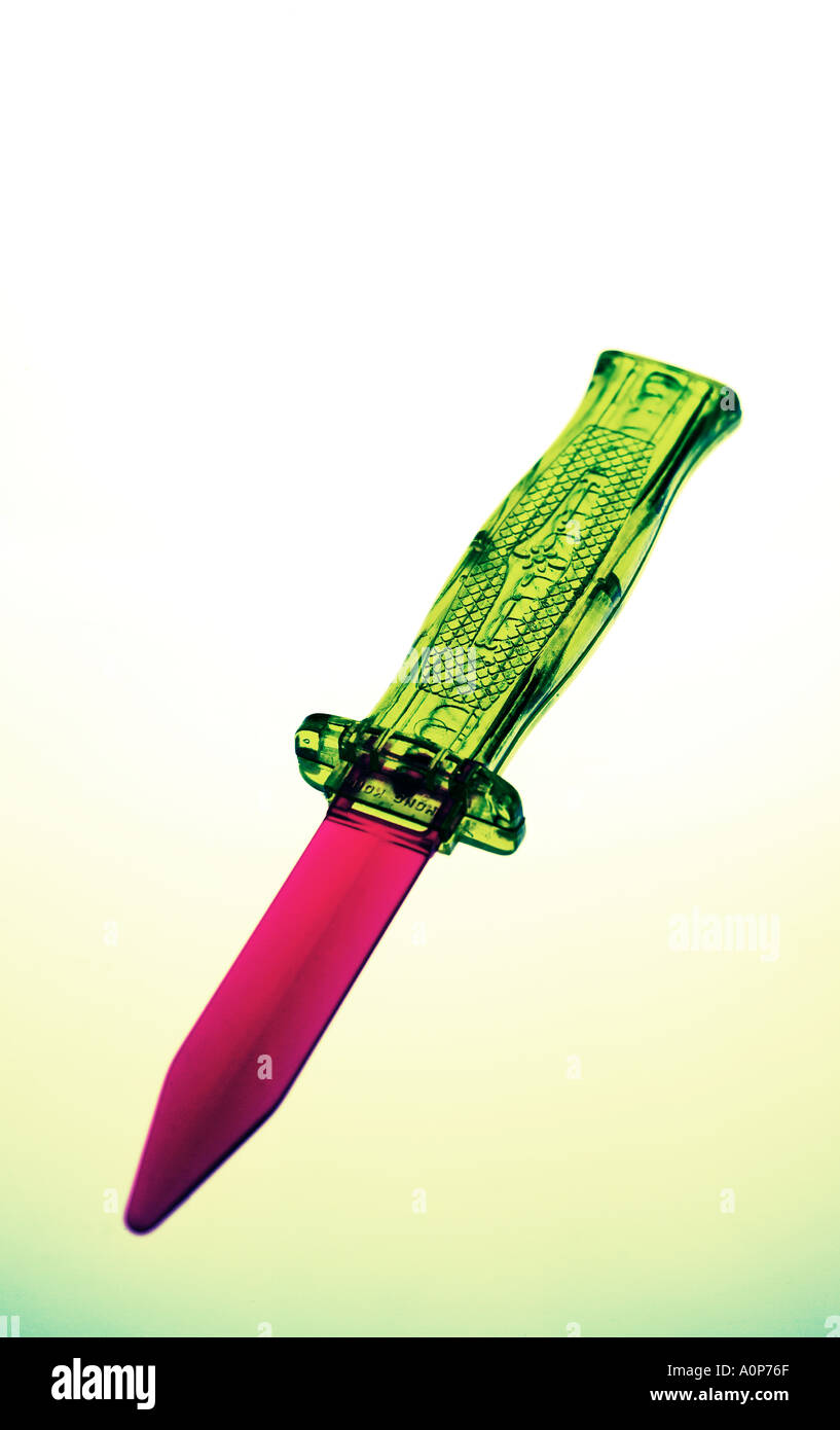 Toy spring loaded dagger Stock Photo