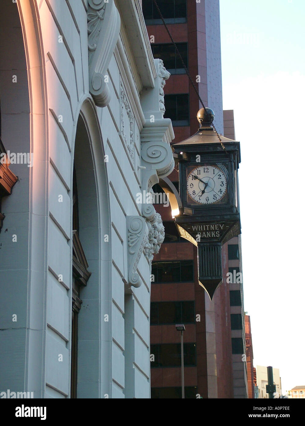 Old clock outside bank Warehouse District Street New Orleans Louisiana