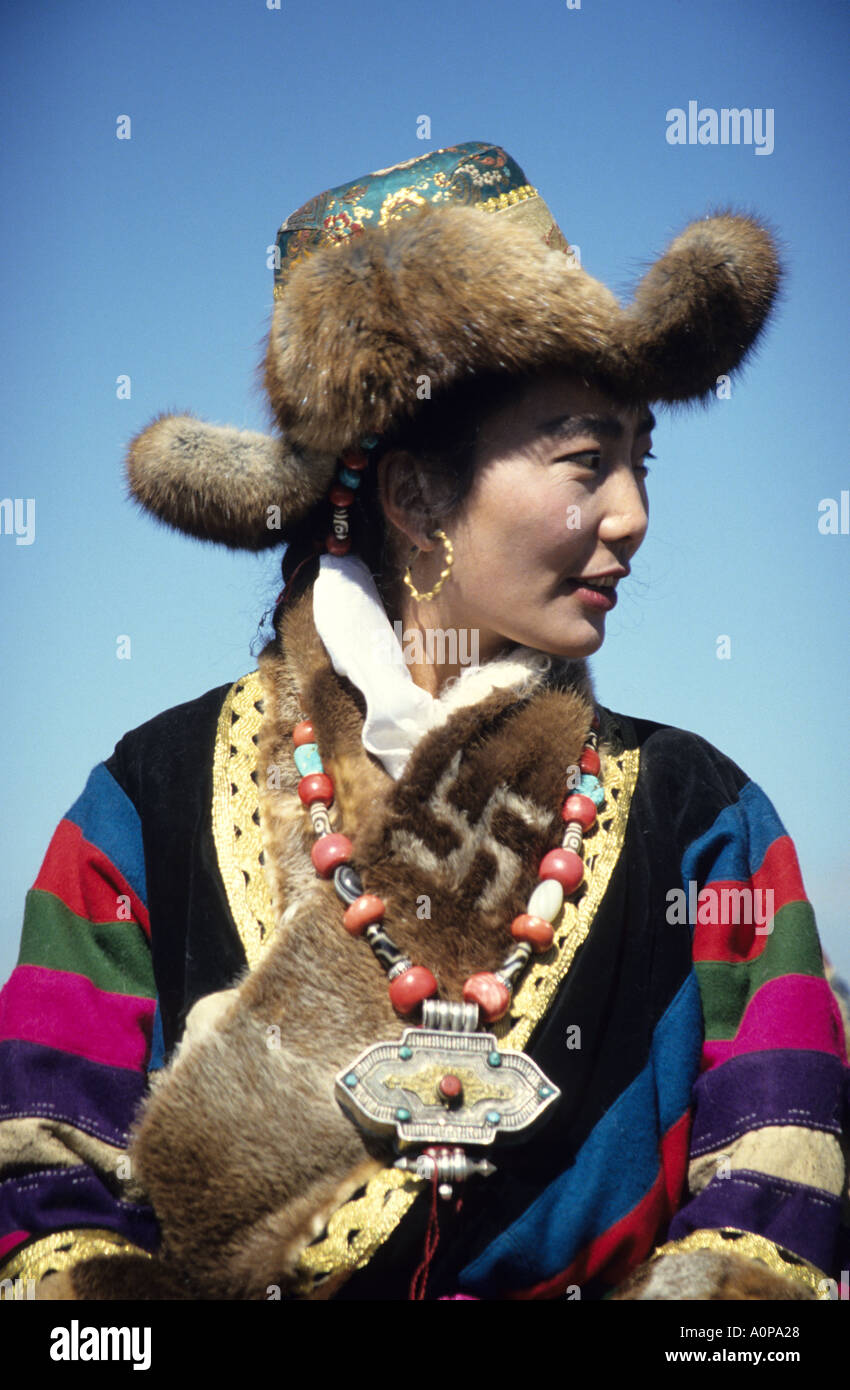 Nomadic woman in TIbet dressed for the Naqu annual horse fair.China ...