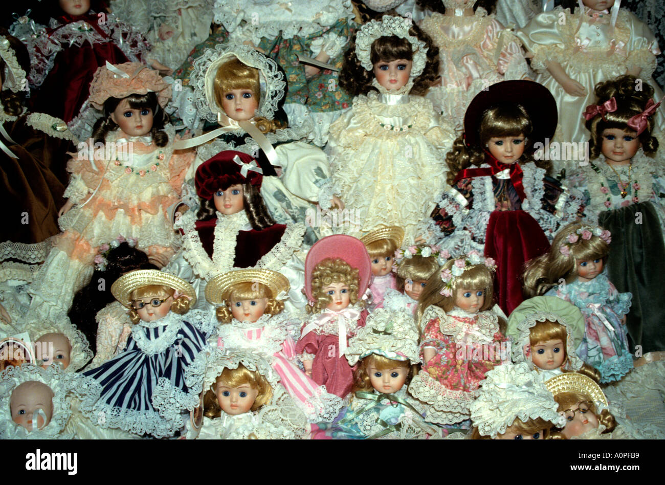 Display of group of exquisitely dressed English porcelain dolls Stock Photo Alamy