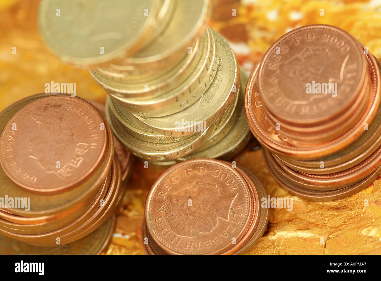 Close up, macro photograph of British money, pound coins, and bronze