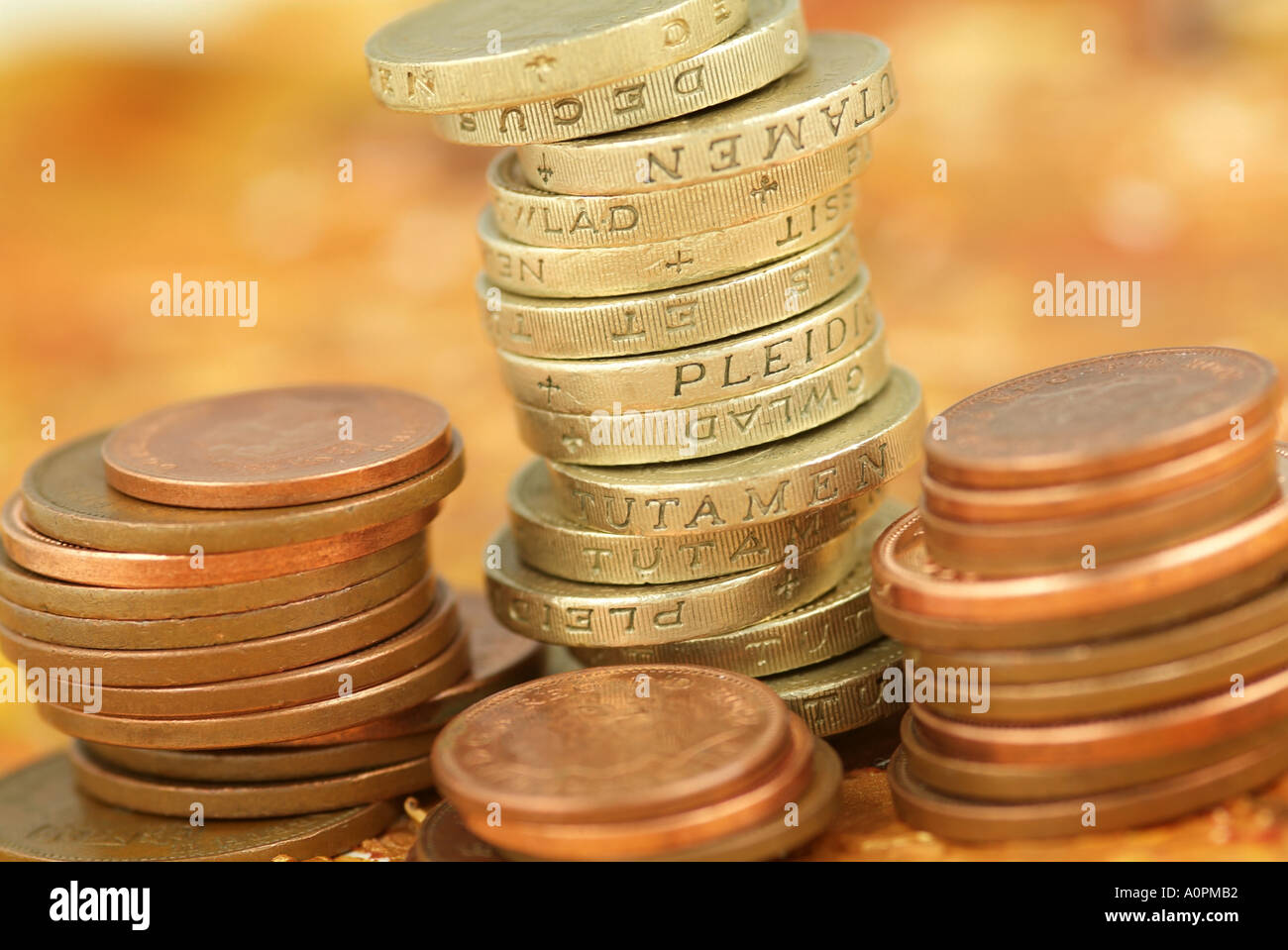 Close up, macro photograph of British money, pound coins, and bronze