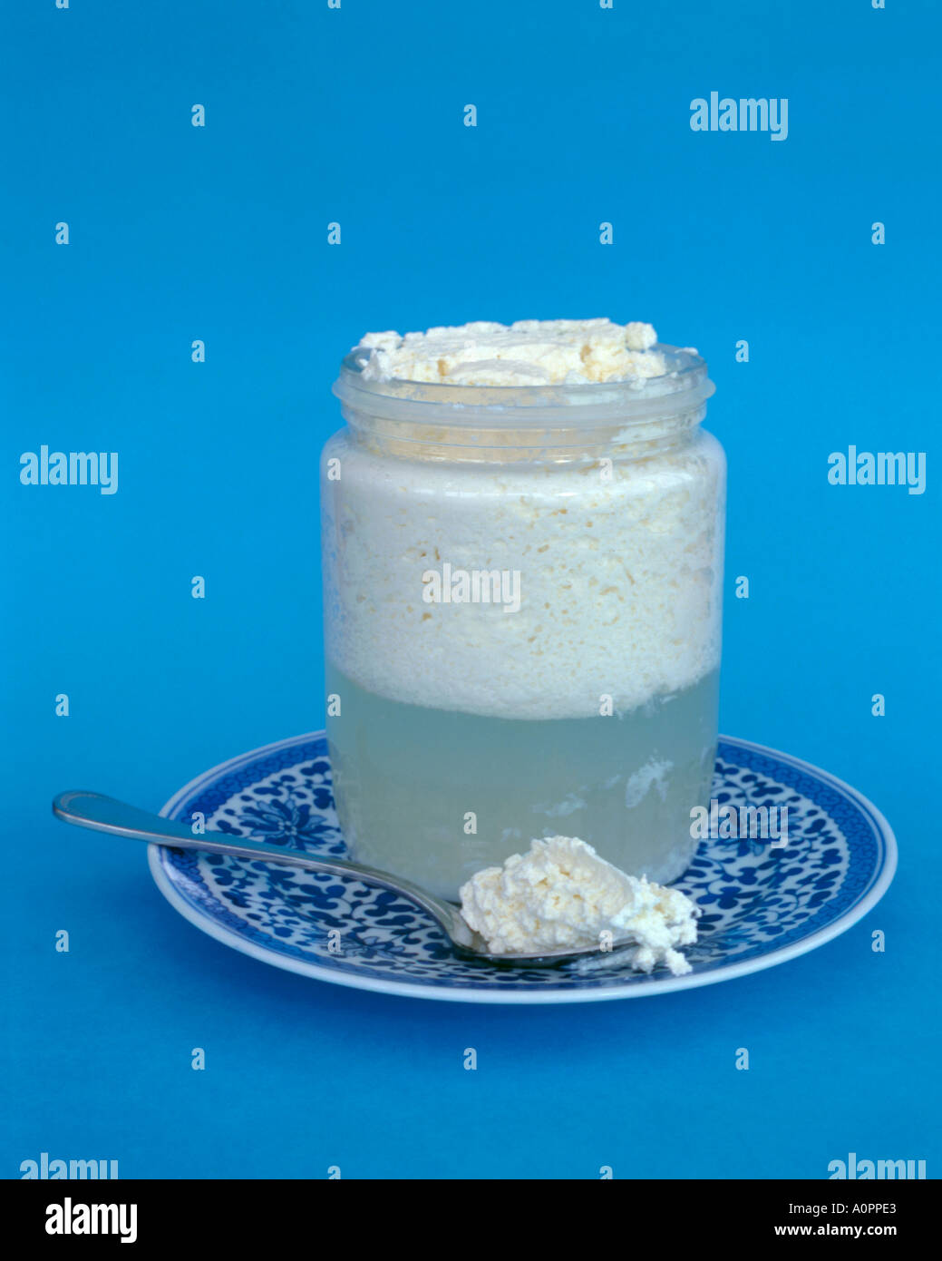 Cheese making, showing the separation of curds and whey, England, UK