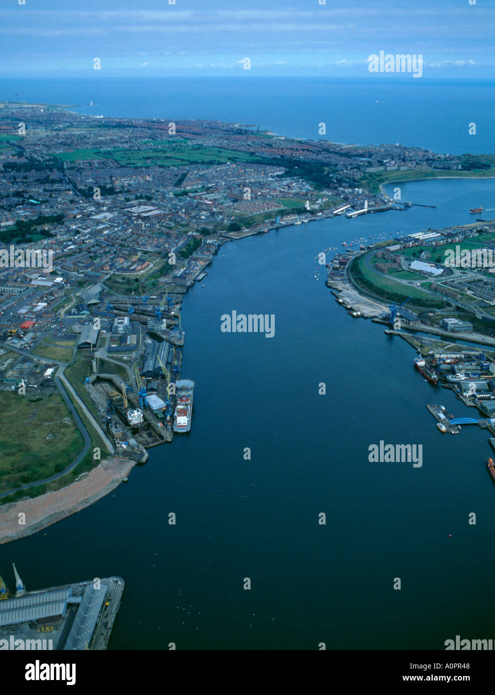 Aerial view over North Shields towards Tynemouth and Whitley Bay, Tyne and Wear, England, UK., in the 1980's. Stock Photo
