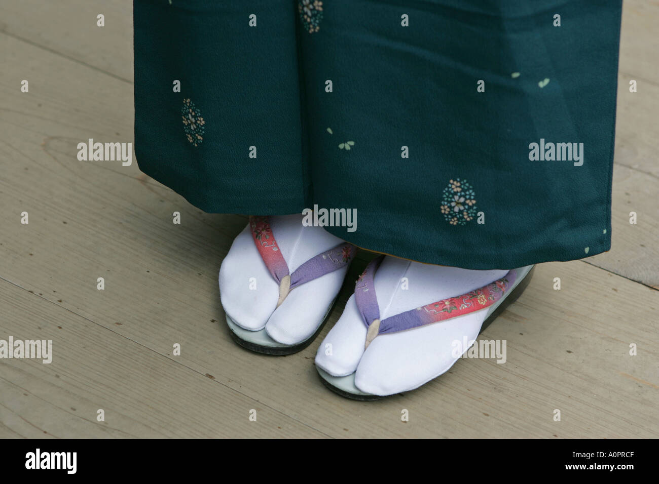 A woman wearing traditional Japanese kimono with contrasting white tabby  socks and kimono sandals Kyoto Kansai Japan Asia Stock Photo - Alamy