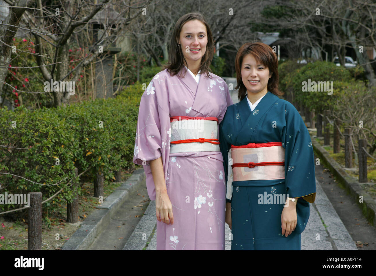 Young western woman with Japanese friend dressed in traditional Japanese  Kimono Kyoto Japan Asia Stock Photo - Alamy