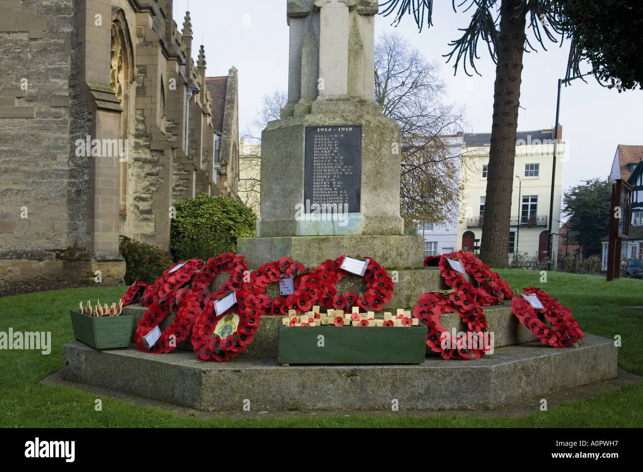 wreaths remembrance sunday  war memorial churchyard st nicholas church historic roman market town of alcester warwickshire the m Stock Photo