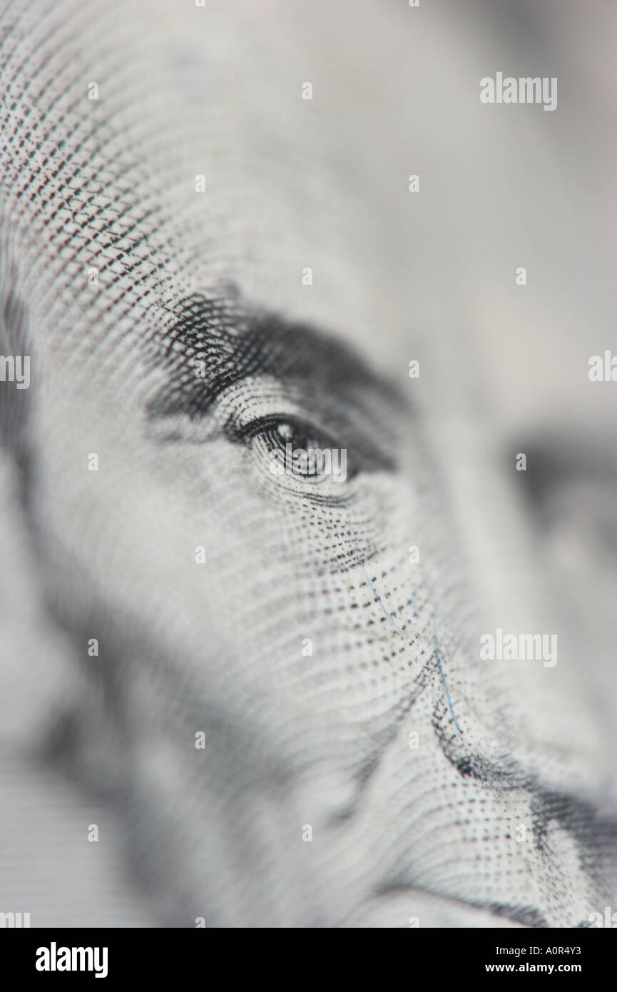 A close up of a U.S. five dollar bill showing a detail of Abraham