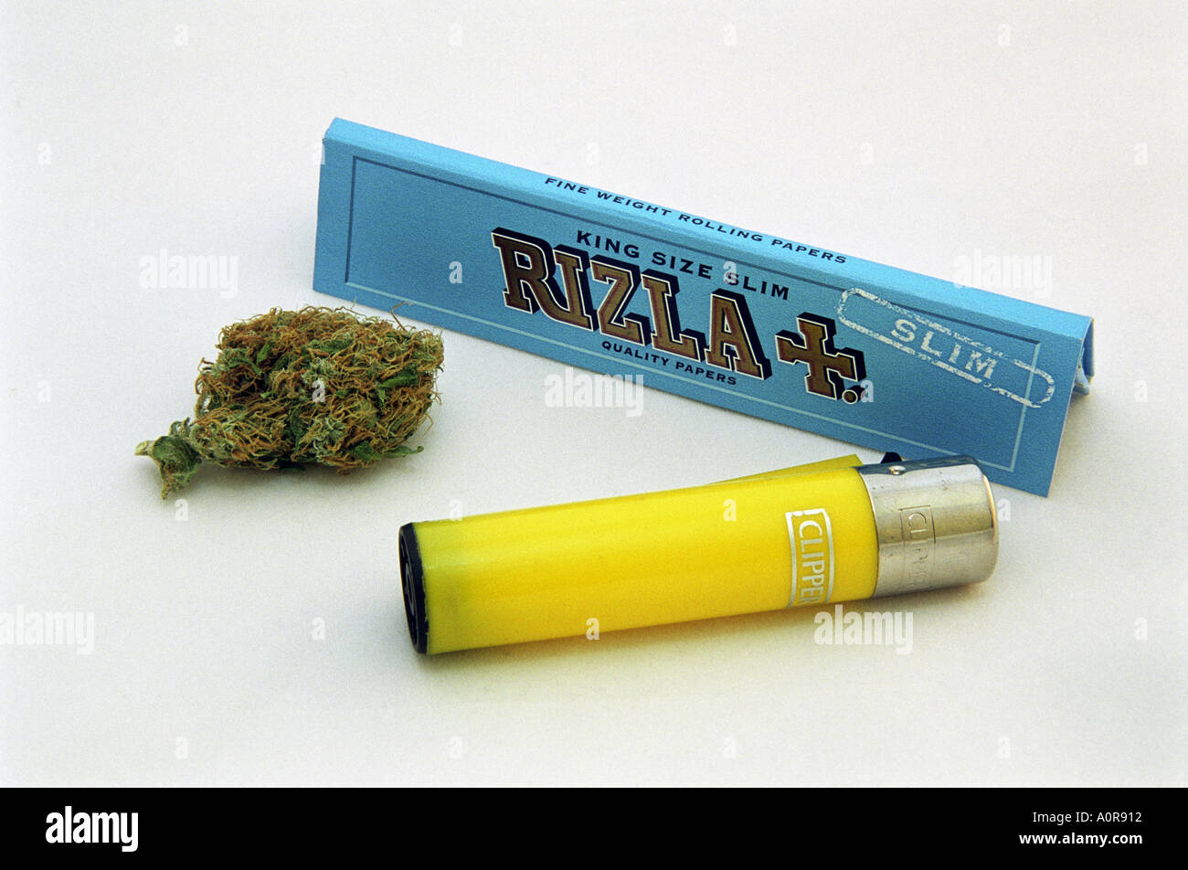 Marijuana with Rizla papers and Clipper lighter Stock Photo