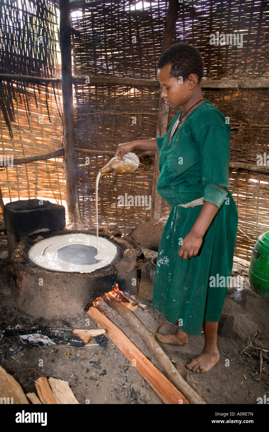 Woman making Injera the staple diet Ethiopia Africa Stock Photo