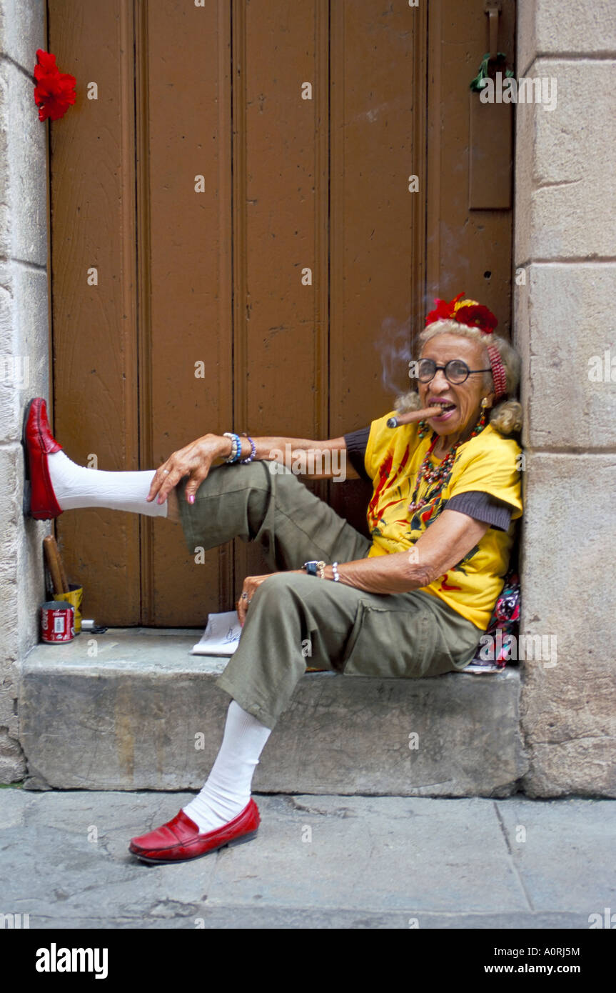 Old lady smoking cigar Calla Empedrado Havana Cuba West Indies Central America Stock Photo