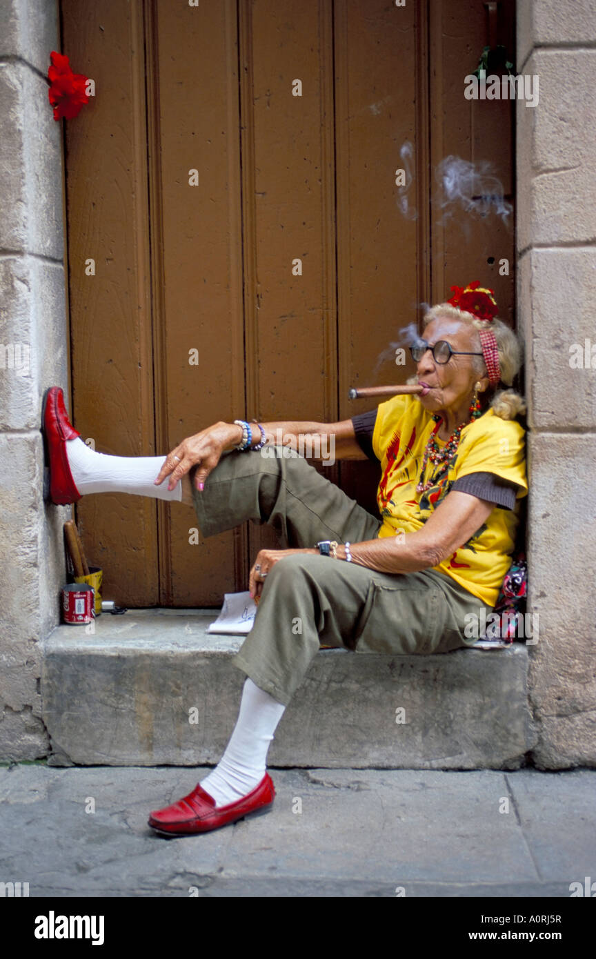 Old lady smoking cigar Calla Empedrado Havana Cuba West Indies Central America Stock Photo