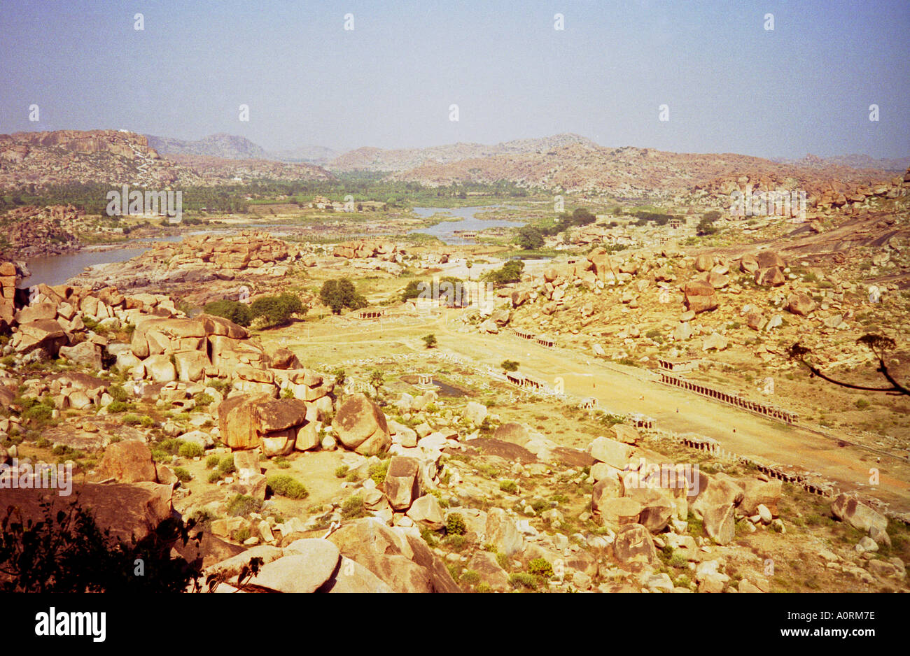 Edge valley magnificent stunning fresh watercourse flora deep rock depth top peak tree Hampi Karnataka India South Asia Stock Photo