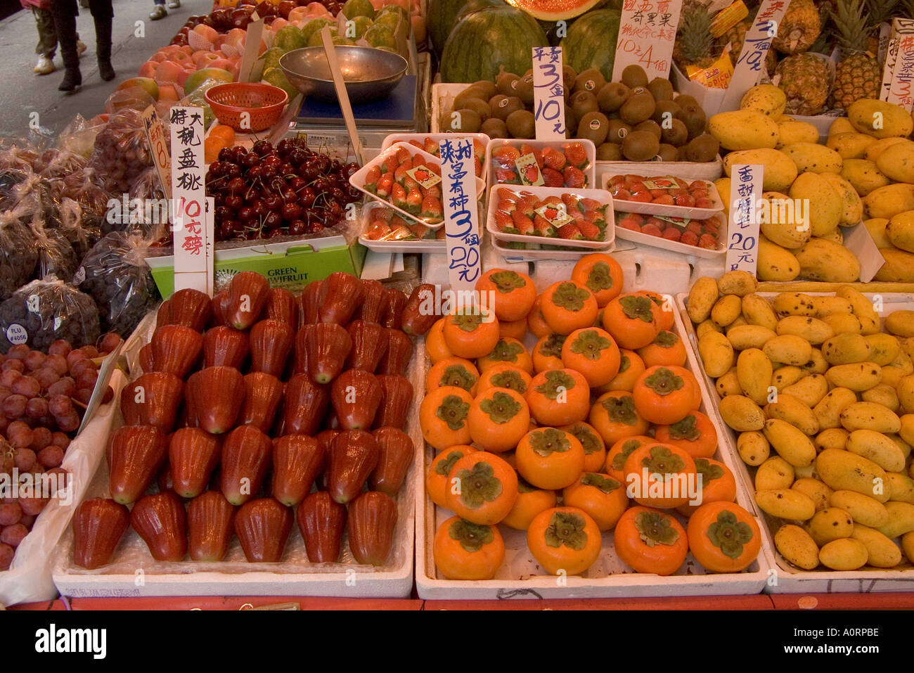 dh  TAIPO HONG KONG Fruit market stall display shop calligraphy price tags farm produce asia Stock Photo