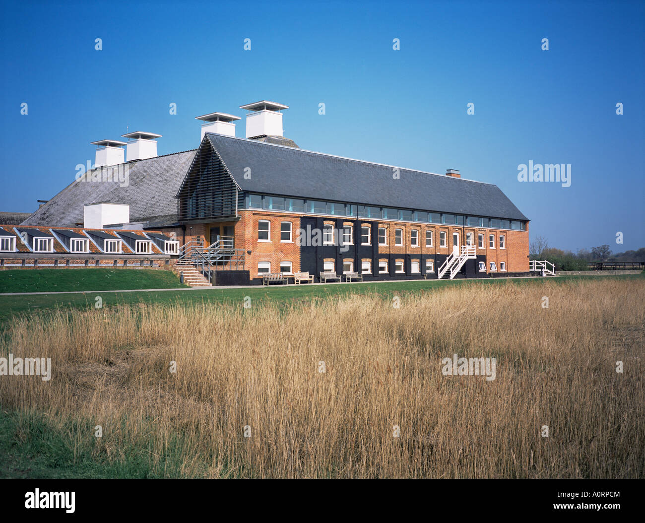 Maltings Concert Hall from the reed beds Snape Suffolk England United Kingdom Europe Stock Photo