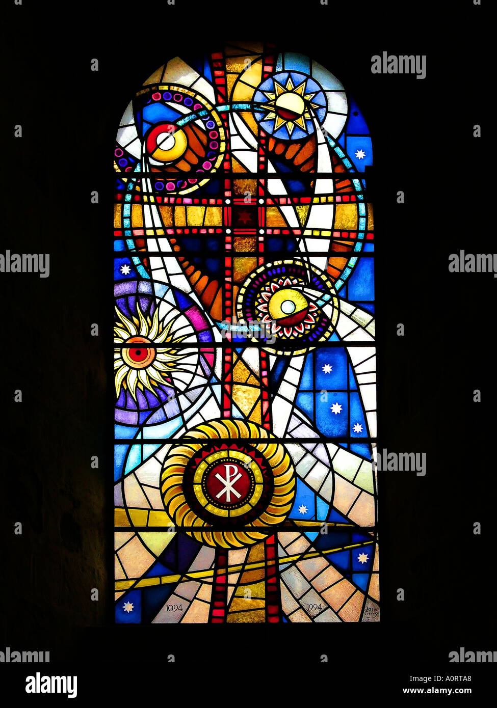 The 900th Anniversary Stained Glass Window at The Priory Christchurch Dorset United Kingdom Stock Photo