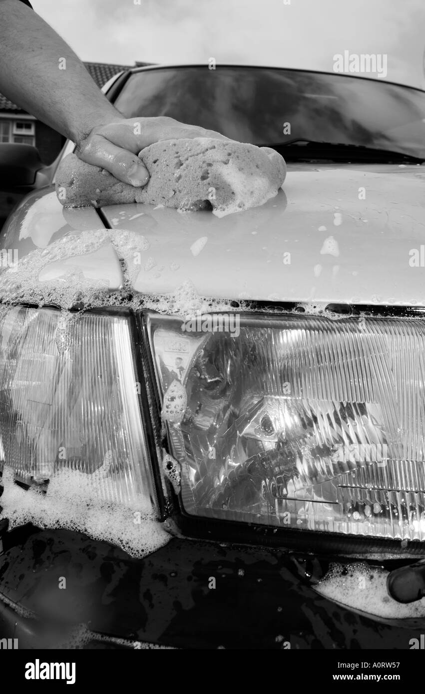 car wash washing clean polish soap suds soapy bucket water road dirt dirty car Stock Photo Alamy