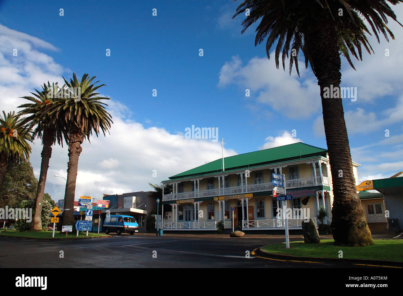 Harbourside Hotel and date palms street scene in Raglan New Zealand Stock Photo