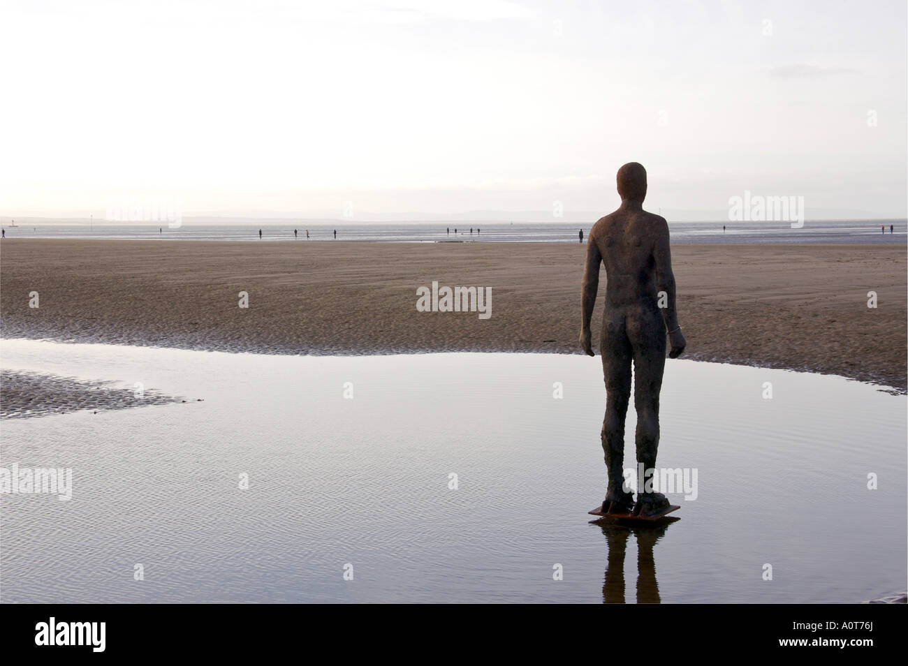 Anthony Gormley's bronze sculptures Crosby beach near Liverpool England