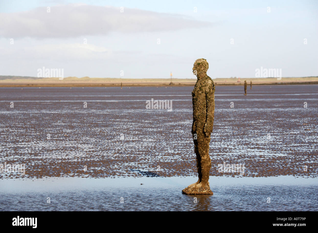 Anthony Gormley's bronze sculptures Crosby beach near Liverpool England