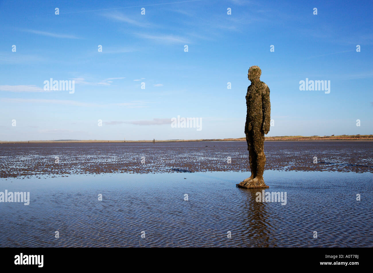 Anthony Gormley's bronze sculptures Crosby beach near Liverpool England