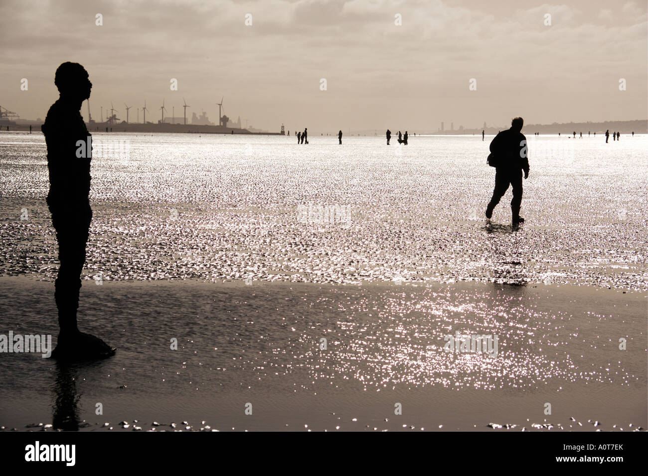 Anthony Gormley's bronze sculptures Crosby beach near Liverpool England