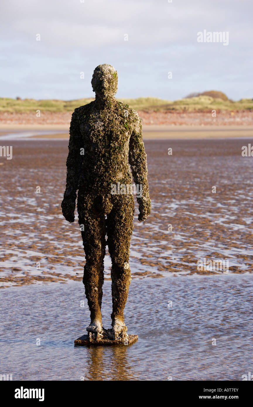 Anthony Gormley's bronze sculptures Crosby beach near Liverpool England  Stock Photo - Alamy