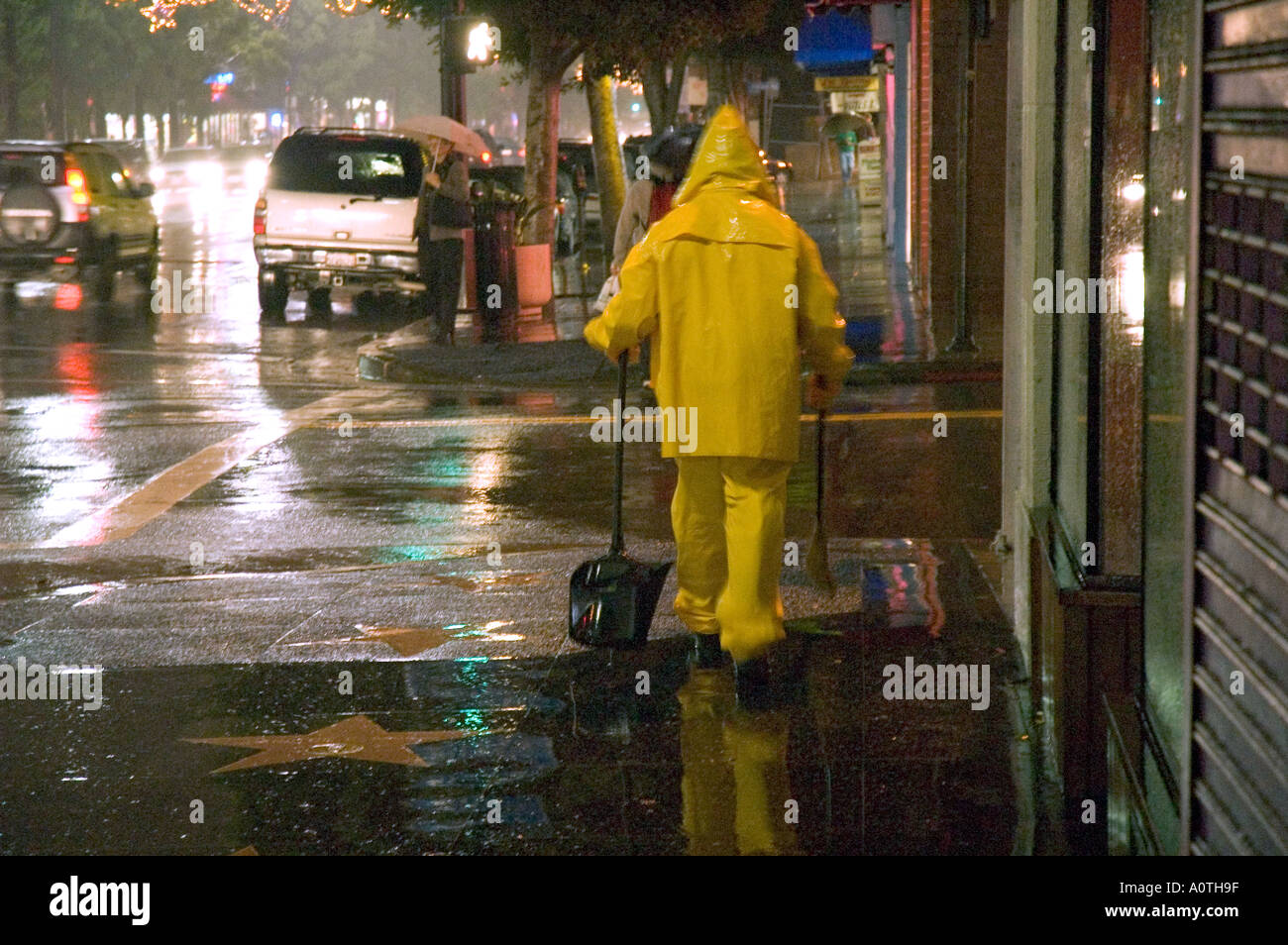 Street sweeper on a rainy night on Hollywood Boulevard Stock Photo