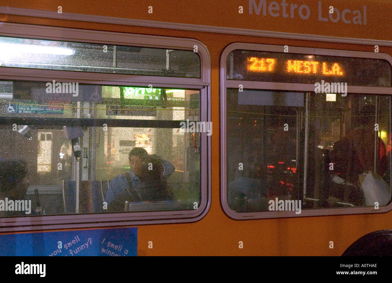 Night time close up of a bus on Hollywood Boulevard in the rain Stock Photo