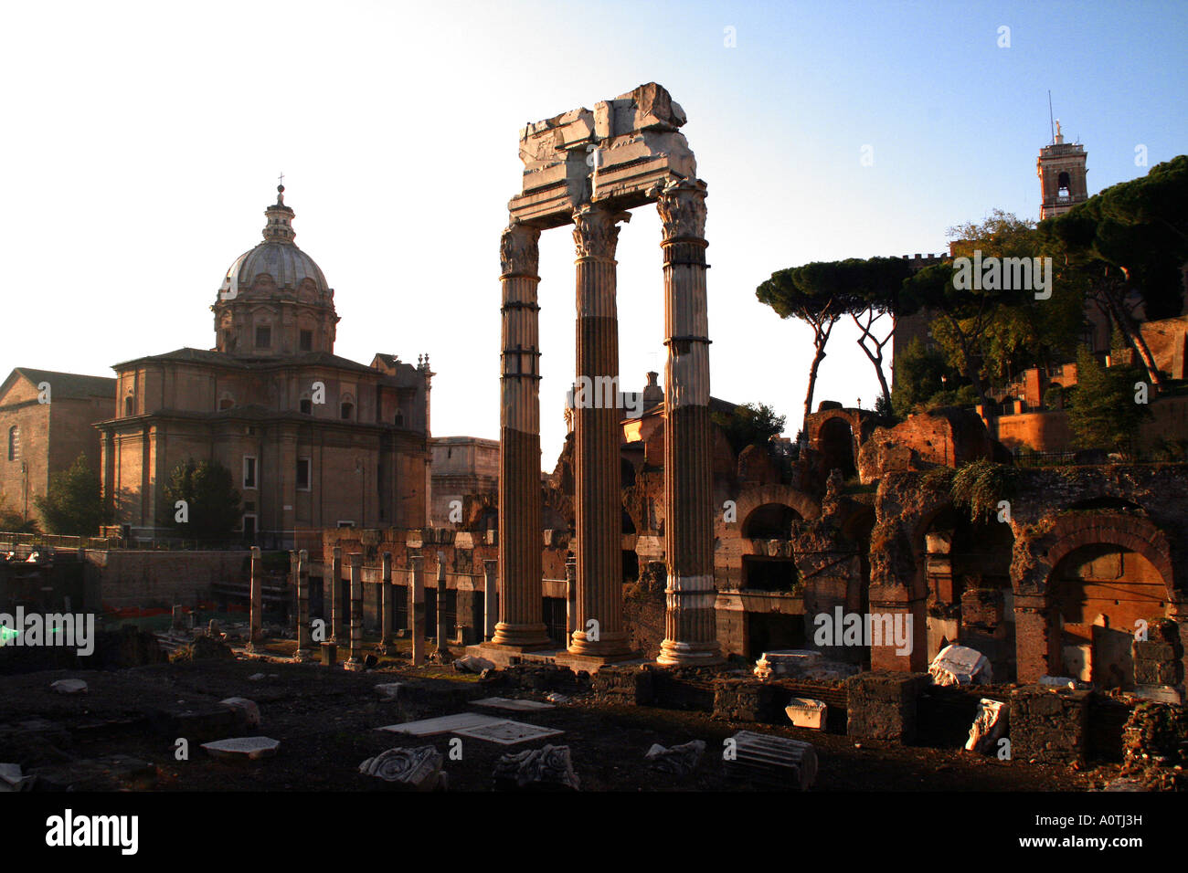 The three columns of the Temple of Vespasian in the Roman Forum Rome Italy Stock Photo - Alamy