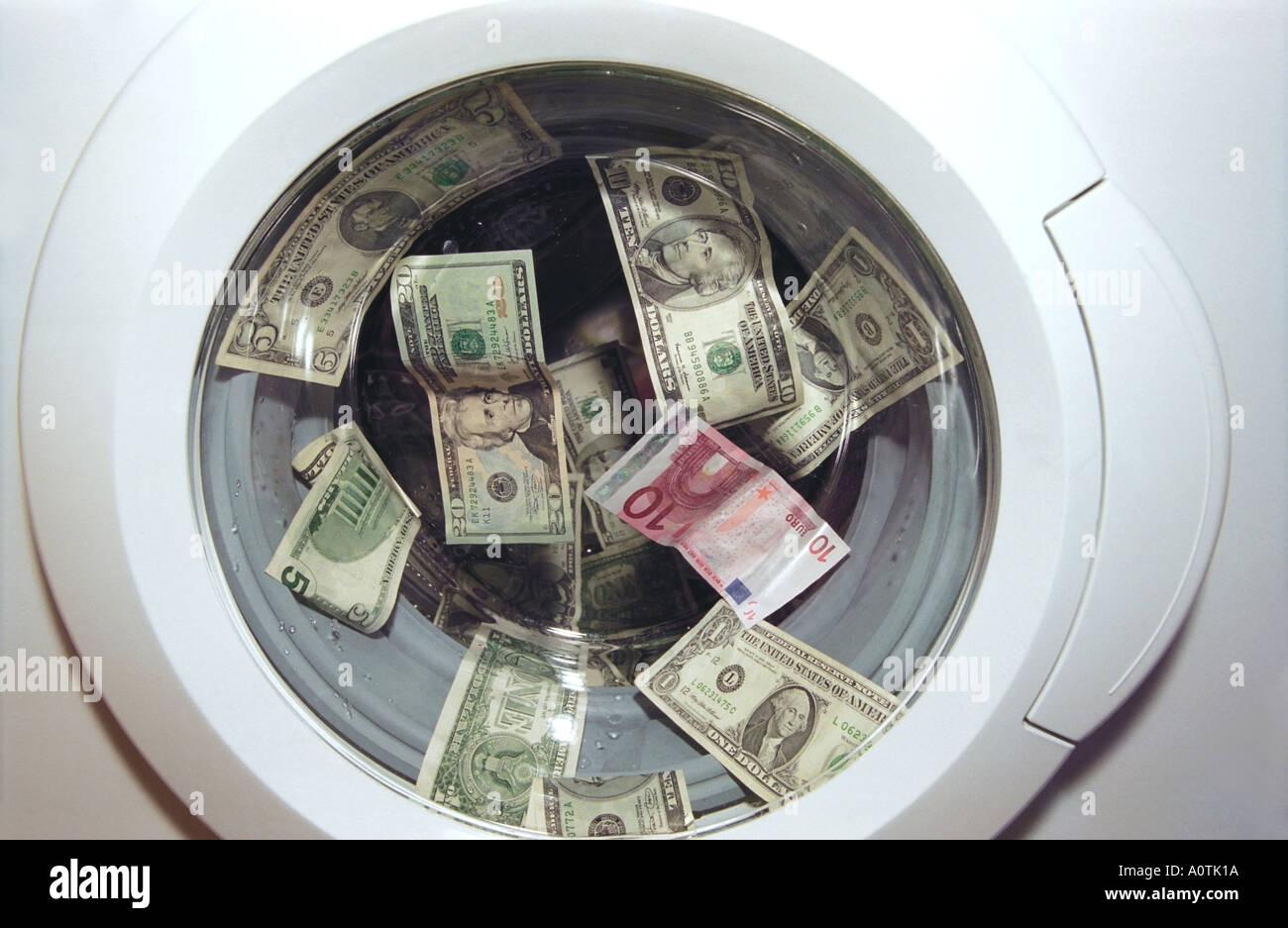 Money washing machine hires stock photography and images Alamy