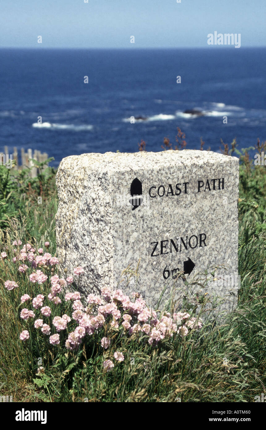 Pendeen Watch engraved stone marker for the Cornwall coast path showing Pendeen Watch engraved stone marker for the Cornwall coast path showing