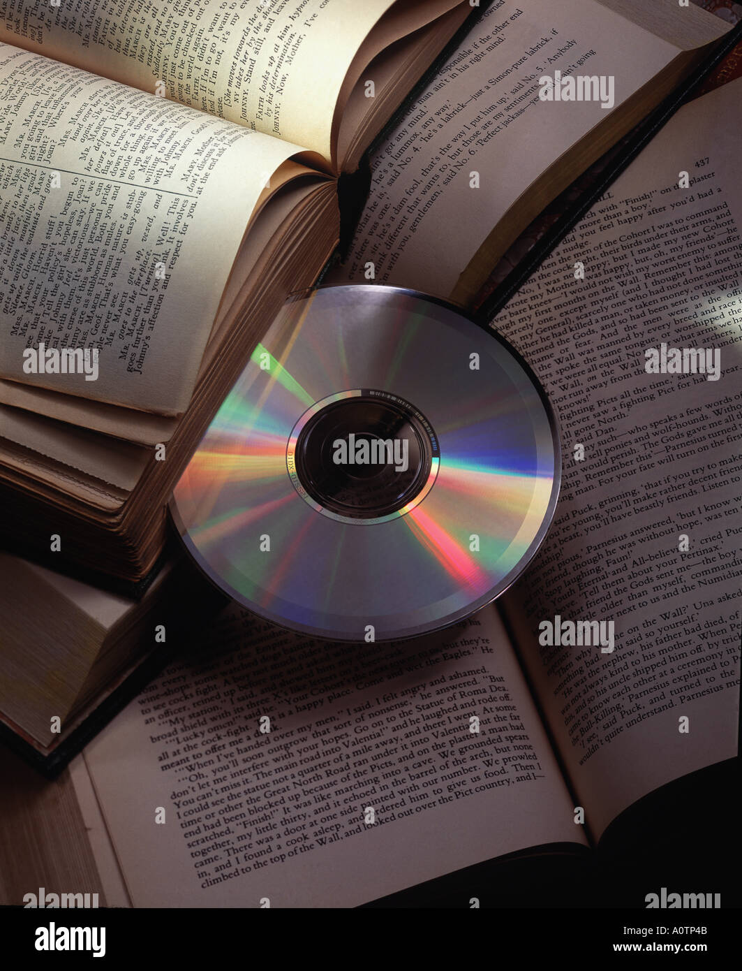 still life of printed material comparison with information on DVD Stock Photo