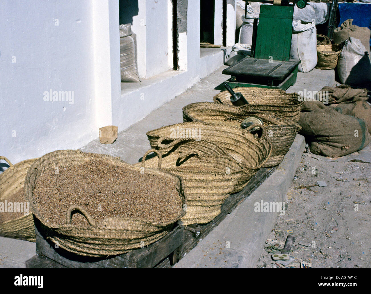 AFRICA MOROCCO TANGIER Straw baskets of grains and seeds for sale in