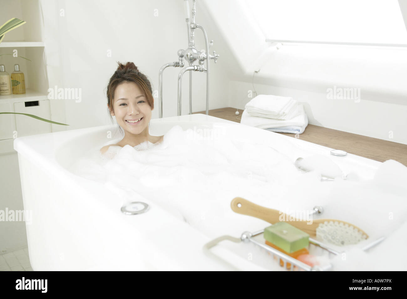 Relaxing woman in bathtub hi-res stock photography and images - Alamy