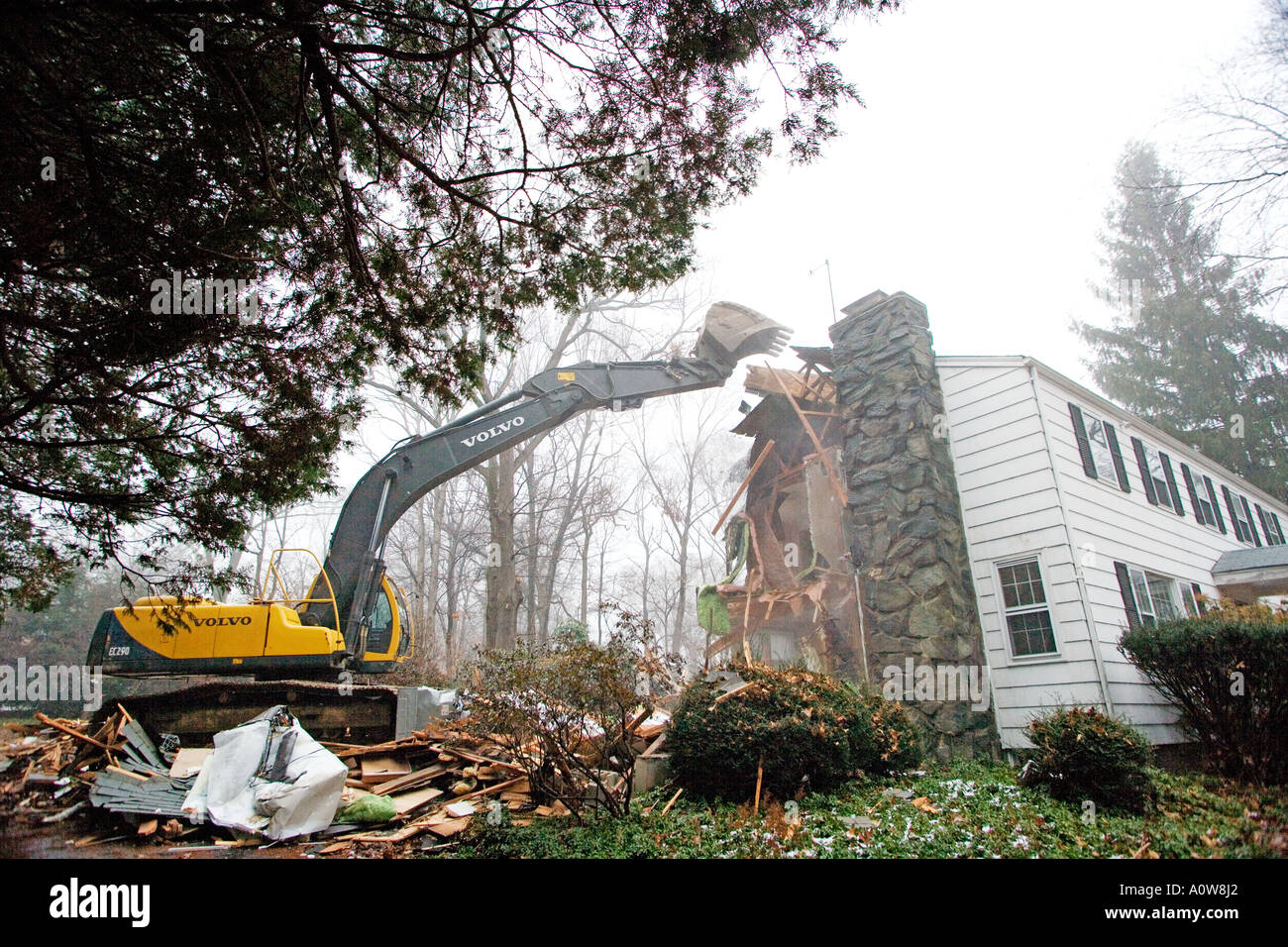 Home being torn down to build MacMansion Stock Photo Alamy