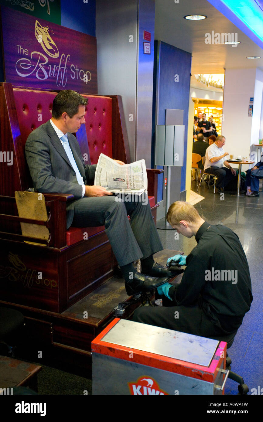 shoe shine boy at work Stock Photo Alamy