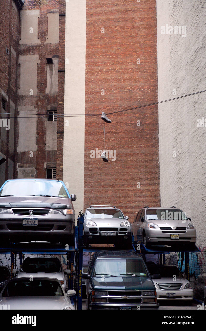 Manhattan Parking Garage With The Boots Hanging Over The Wires