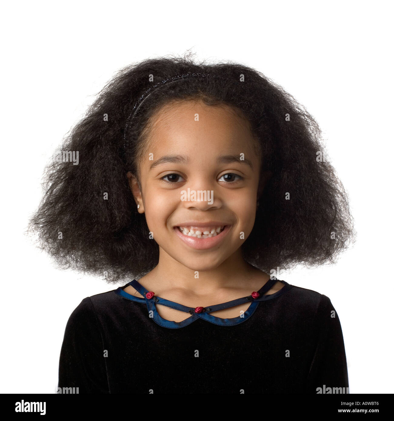 Portrait of Smiling 7 - 9 Year Old Adorable African American girl Stock Photo