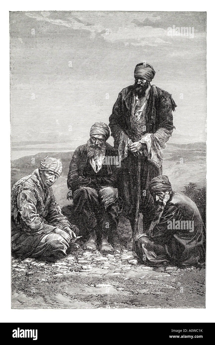 Jew Jewish Mesopotamia itinerant old men beard Syria middle east trade desert arid sit sat stand talk group suspicious wary unsu Stock Photo