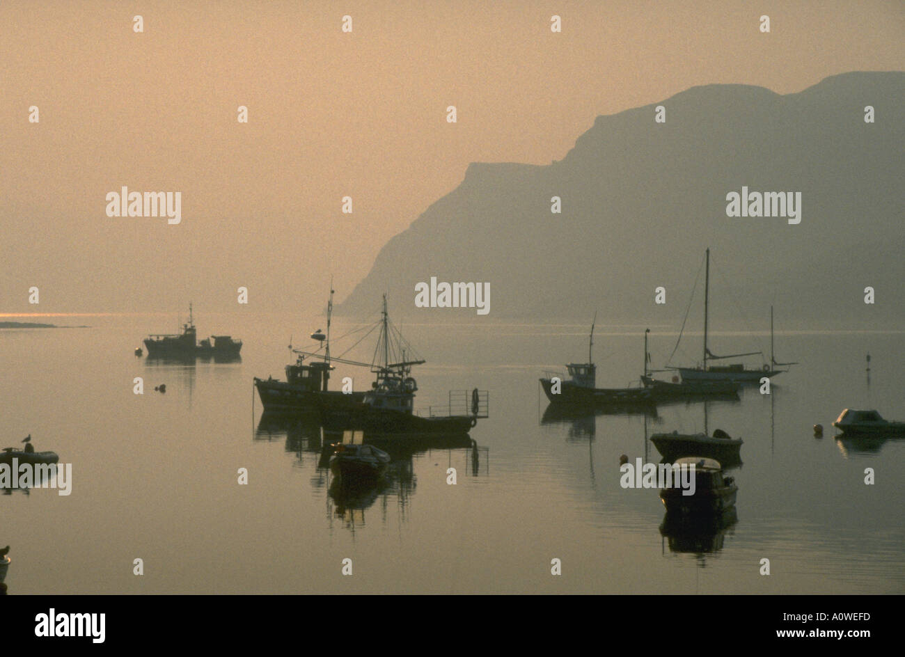 Dusk at Portree Harbour Isle of Skye Scotland Stock Photo